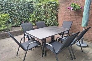 Outdoor dining - Holiday home with 3 bedrooms (Norden, Deutschland)