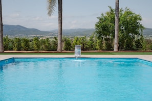 Outdoor pool, open 8:00 AM to midnight, sun loungers