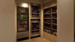 A storage area with shelves containing various beverages and bottles. - Fairfield by Marriott Inn & Suites Nags Head (Nags Head)