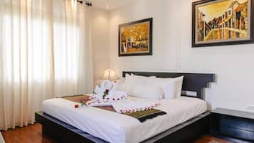 Apartamento, 2 quartos | Escrivaninha, Wi-Fi de cortesia, roupa de cama