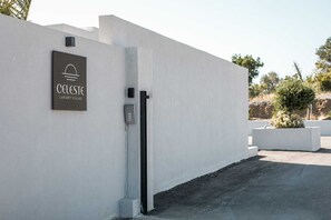 A modern building with a sign reading 'CELESTE LUXURY VILLAS' and a keypad for access. - Celeste Luxury Villas | Villa Gea, Villa (Rhodes)