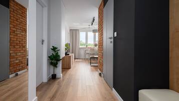 Comfort Apartment, Balcony, City View | Living area | 30-inch Smart TV with satellite channels