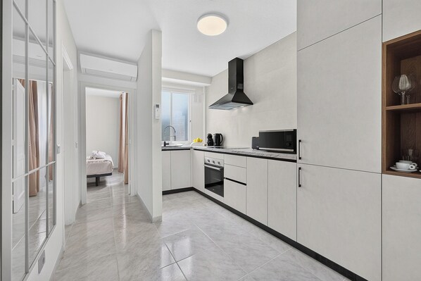 Premium Suite, Balcony, Sea View | Private kitchen | Espresso maker, full-size fridge, microwave, oven - Coast Suites (Alcalá)