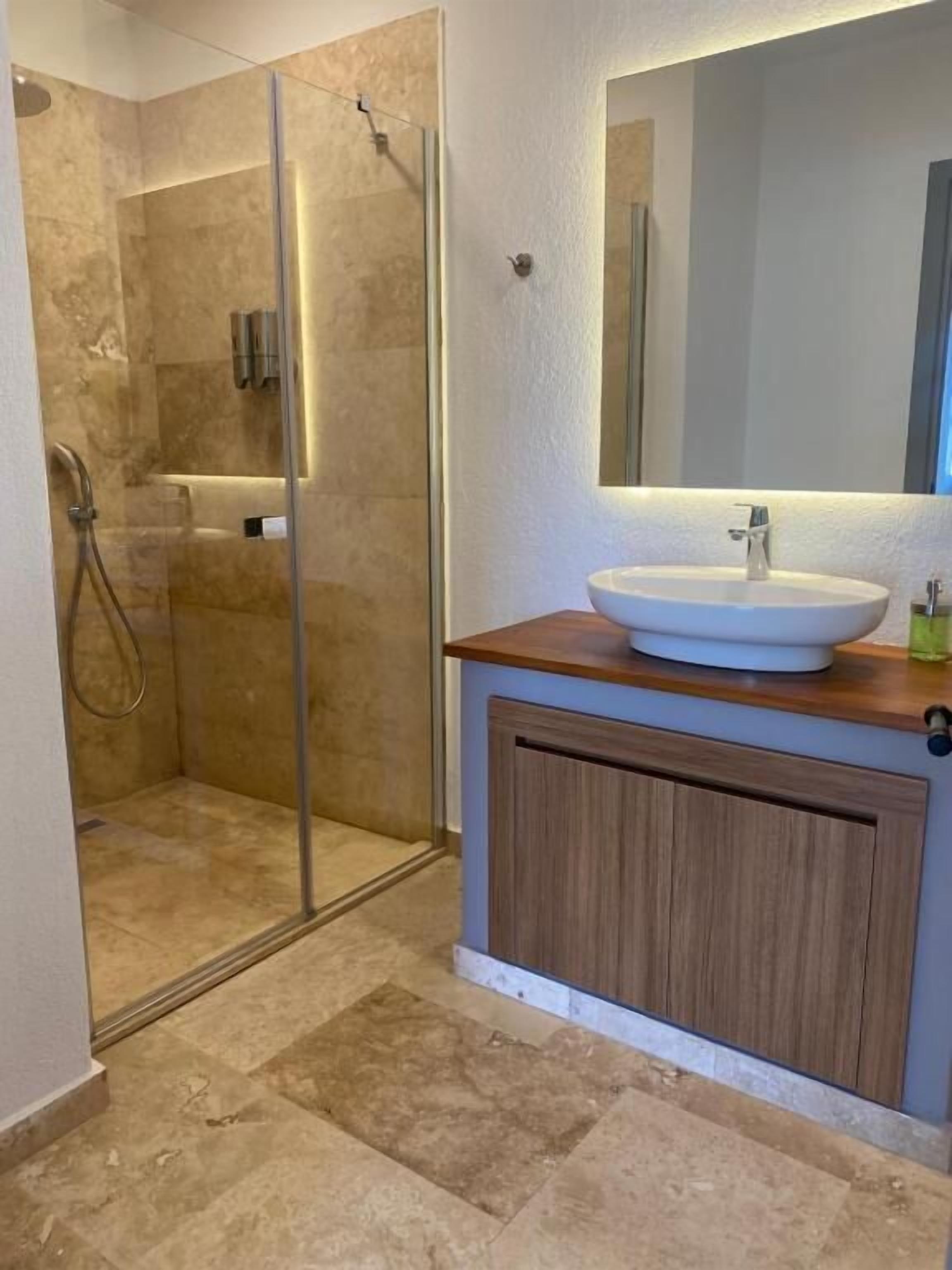 Shower, free toiletries, hair dryer, slippers