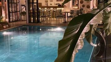 Outdoor pool, open 9:00 AM to 7:00 PM, pool umbrellas, sun loungers