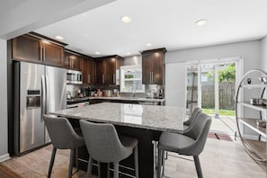 Private kitchen - Waldo Blue Haven KC Home With Pergola Deck and Fenced Yard (Kansas City)