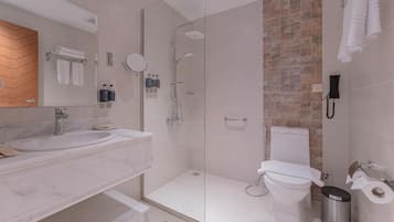 Separate bathtub and shower, hair dryer, slippers, towels