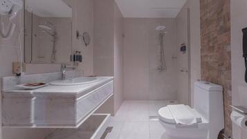 Grand Suite, City View | Bathroom | Separate bathtub and shower, hair dryer, slippers, towels