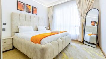 Classic Apartment, Balcony, City View | In-room safe, desk, laptop workspace, iron/ironing board