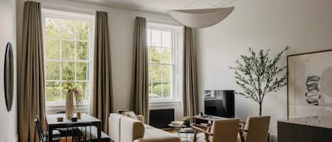 Appartement Deluxe, vue sur la ville | Aire de séjour