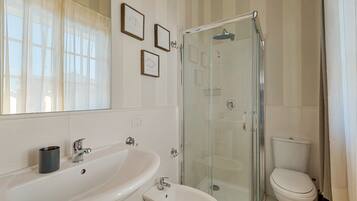 Shower, jetted tub, hair dryer, bidet