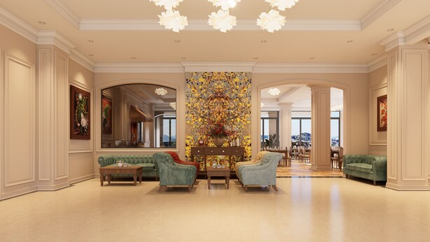 A spacious lobby with a high ceiling, elegant furniture, and a large floral wall decoration. - Dalabiang Hotel (Xuan Huong - Da Lat)