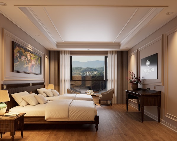 A hotel room with a large bed, a desk, a chair, a TV, and a painting. - Dalabiang Hotel (Xuan Huong - Da Lat)