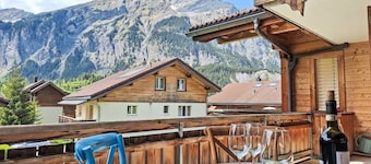 Sunny alpine place in middle of Bernese Oberland, mountain views, hiking trails.