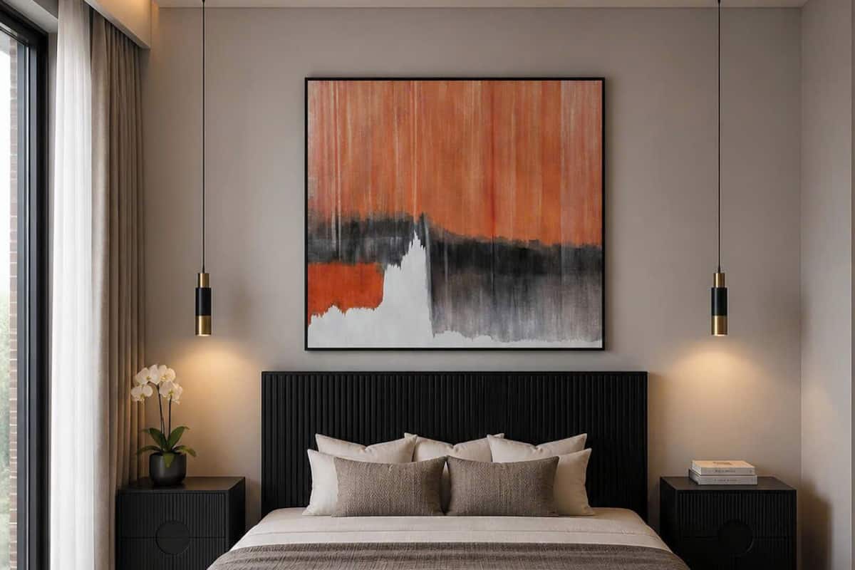 A modern bedroom with a large bed, two bedside tables, a wall-mounted abstract painting, and a window with curtains.
