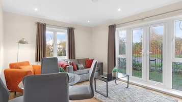 Family Apartment | Living area | 42-inch Smart TV with digital channels, Netflix, streaming services