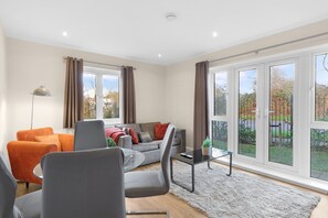 Family Apartment | Living area | 42-inch Smart TV with digital channels, Netflix, streaming services - Heathrow Living Apt  01 by 360 Stays (Stanwell)
