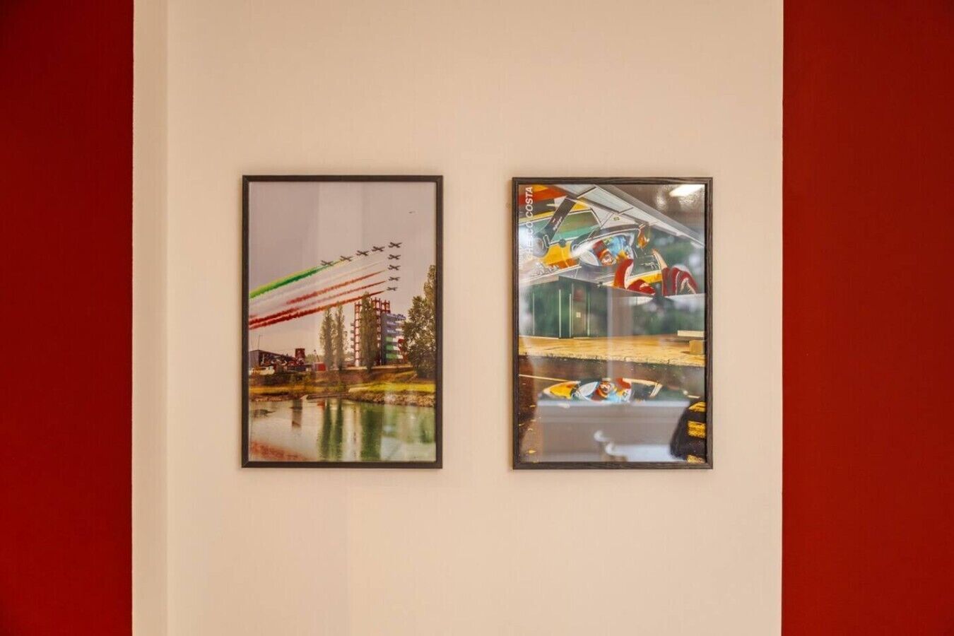 Two framed artworks on a wall.