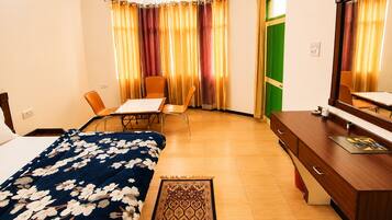 Deluxe Room, Hill View | Desk, laptop workspace, blackout curtains, rollaway beds