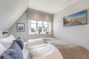 Een strijkplank/strijkijzer, gratis wifi, beddengoed