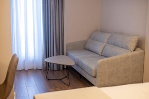 Quarto casal luxo | Área de estar