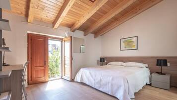 Superior Double Room, Garden View | In-room safe, desk, soundproofing, iron/ironing board