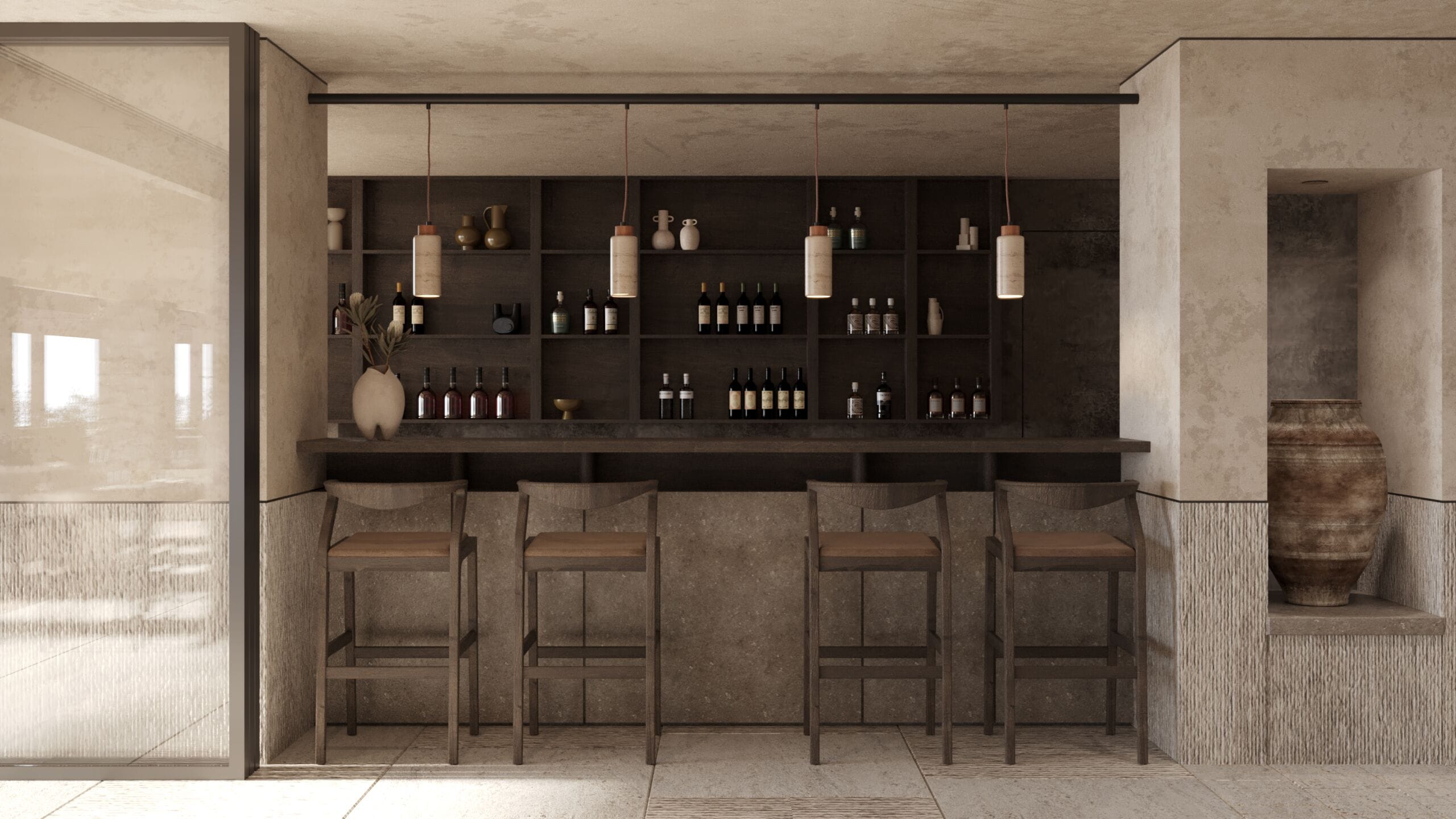 A bar area with a long counter, multiple shelves of bottles, and three wooden bar stools.