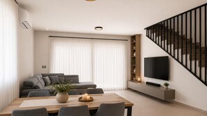 A modern living room with a sofa, dining table, chairs, a TV, and a staircase. - Amazing home in Privlaka (Privlaka)