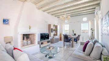 Luxury Villa, Private Pool, Sea View | Living area | 45-inch Smart TV with cable channels, fireplace
