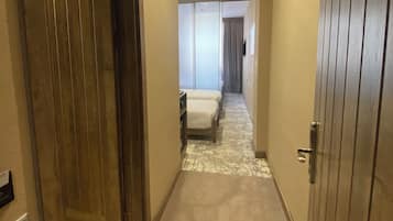Family Quadruple Room | In-room safe, blackout drapes, free WiFi, bed sheets