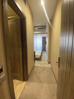 Family Quadruple Room | In-room safe, blackout curtains, free WiFi, bed sheets