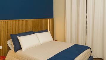 Premium | Premium bedding, down comforters, pillowtop beds, free minibar