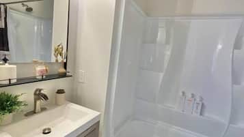 Hair dryer, towels, soap, shampoo