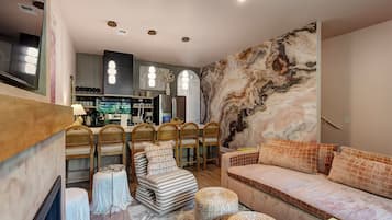 Villa, 4 Bedrooms, Ensuite, Garden View | Living area | 65-inch Smart TV with cable channels