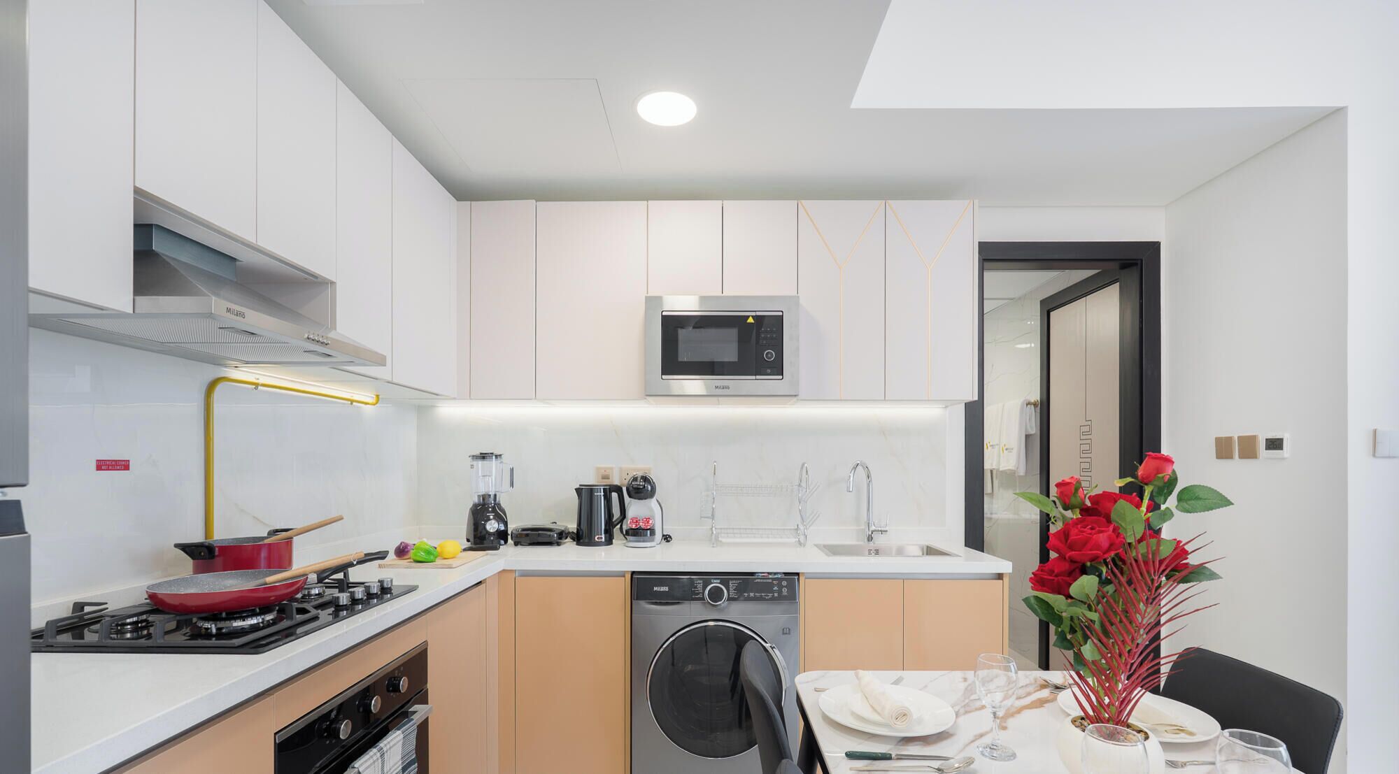 Deluxe Apartment, Balcony, City View | Private kitchen | Electric kettle, toaster, highchair, freezer