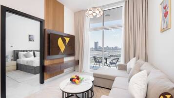 Deluxe Apartment, Balcony, City View | Living area