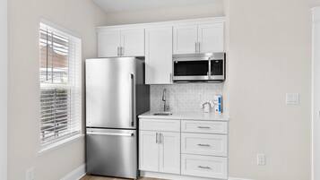Fridge, microwave, coffee/tea maker, toaster