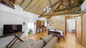 Classic Condo, Balcony, Mountain View | Living area | Toys, printers