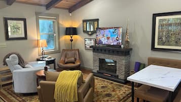 Smart TV, fireplace, books