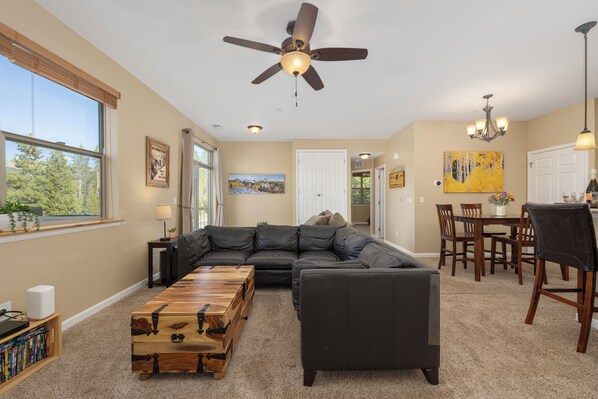 Living area - New, spacious condo in Fraser, private deck and more! (Fraser)