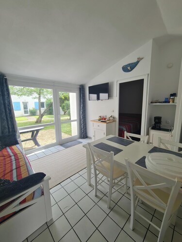 Single-story home in a gated community with a pool and private parking space