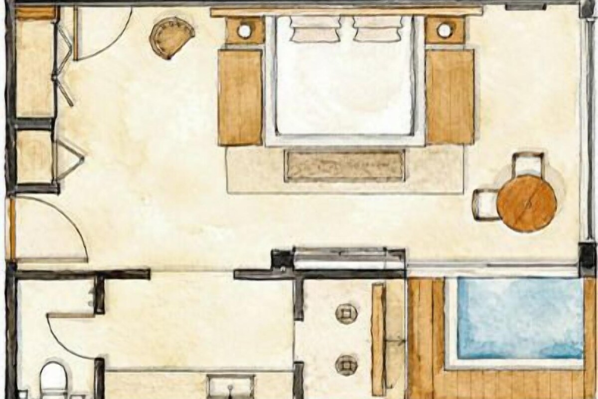 Plànol d'una habitació d'hotel amb llit, zona de seients, bany i una petita piscina.