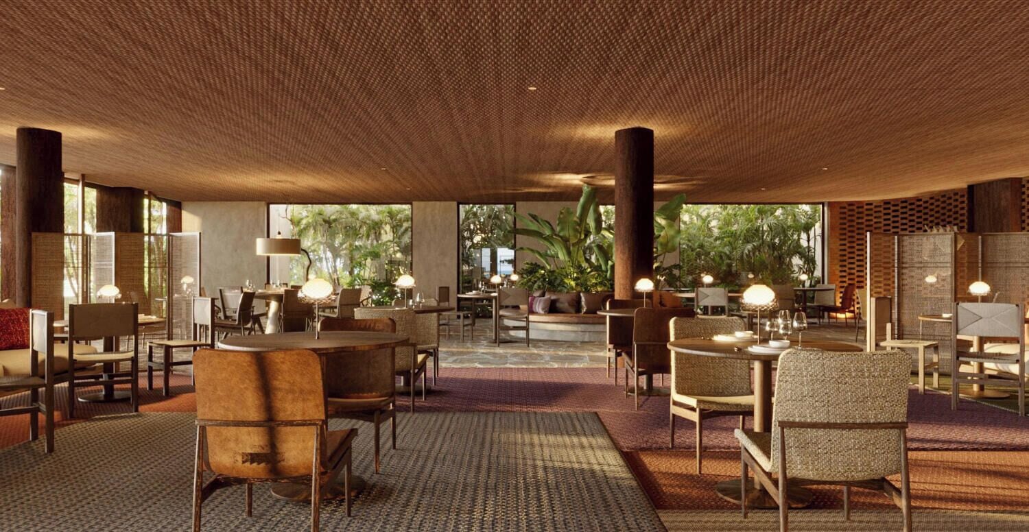 A spacious indoor area with multiple seating arrangements, including tables and chairs, and a ceiling with a textured pattern.