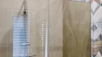 Double Room, Balcony, Beach View | Bathroom | Shower, hair dryer, towels, soap