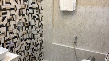 Luxury Room | Bathroom | Shower, soap