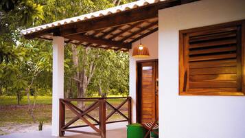 Deluxe Double Room, Garden View | Terrace/patio