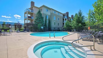 Seasonal outdoor pool, pool umbrellas, sun loungers