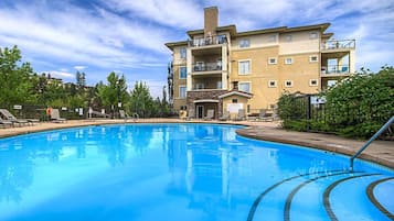 Comfort Condo, 1 Bedroom | Pool | Seasonal outdoor pool, pool umbrellas, pool loungers