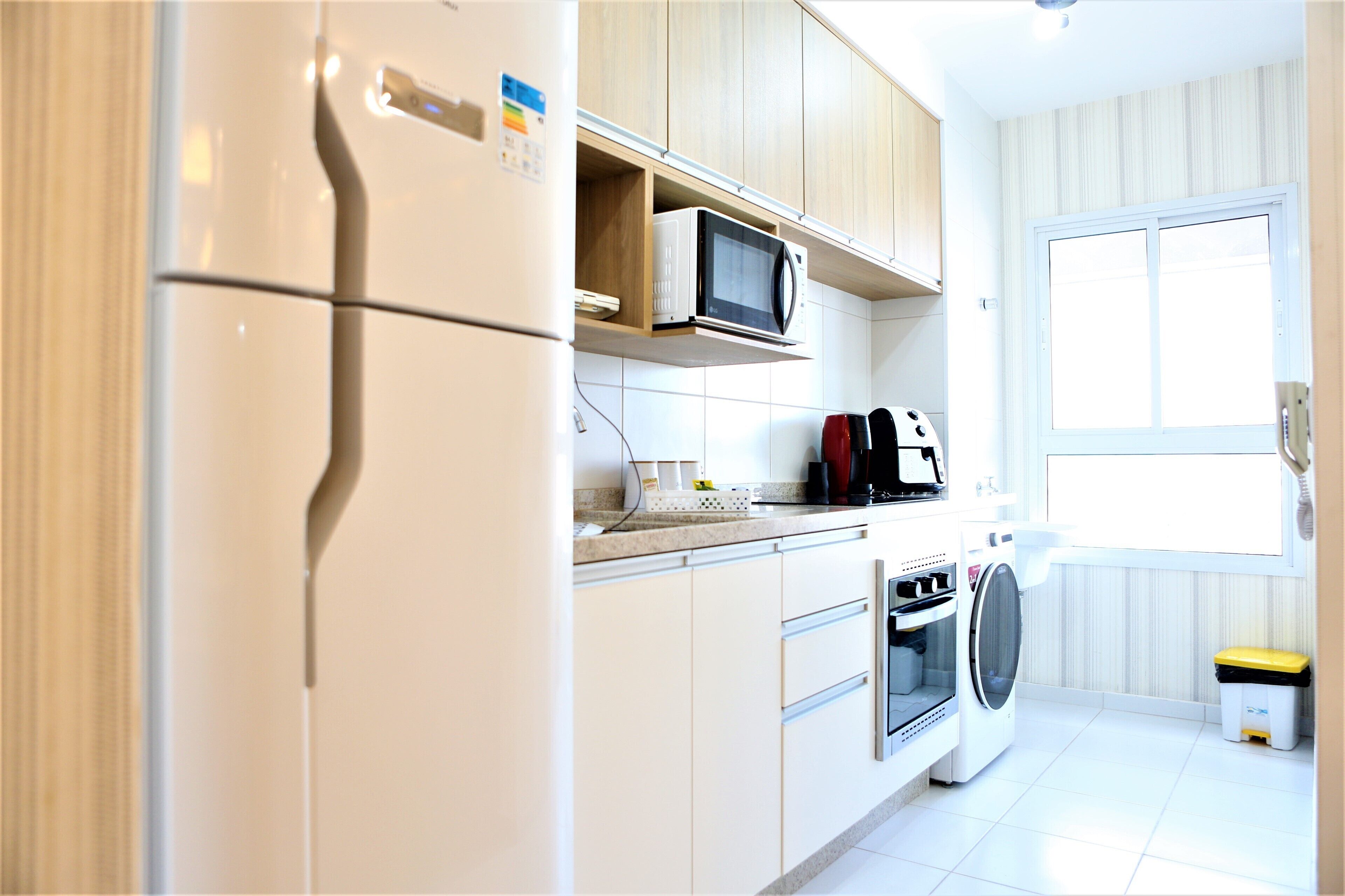 Apartment, Balcony, City View | Private kitchen | Microwave, stovetop, cookware/dishes/utensils
