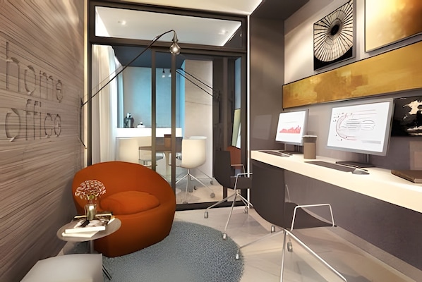 A modern office space with a glass partition, a desk with a computer, and a comfortable orange chair. - PARQUE PRADO IMÓVEIS  (Campinas)